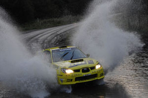 Richard Mason makes a splash on SS1 of the Otago Rally.